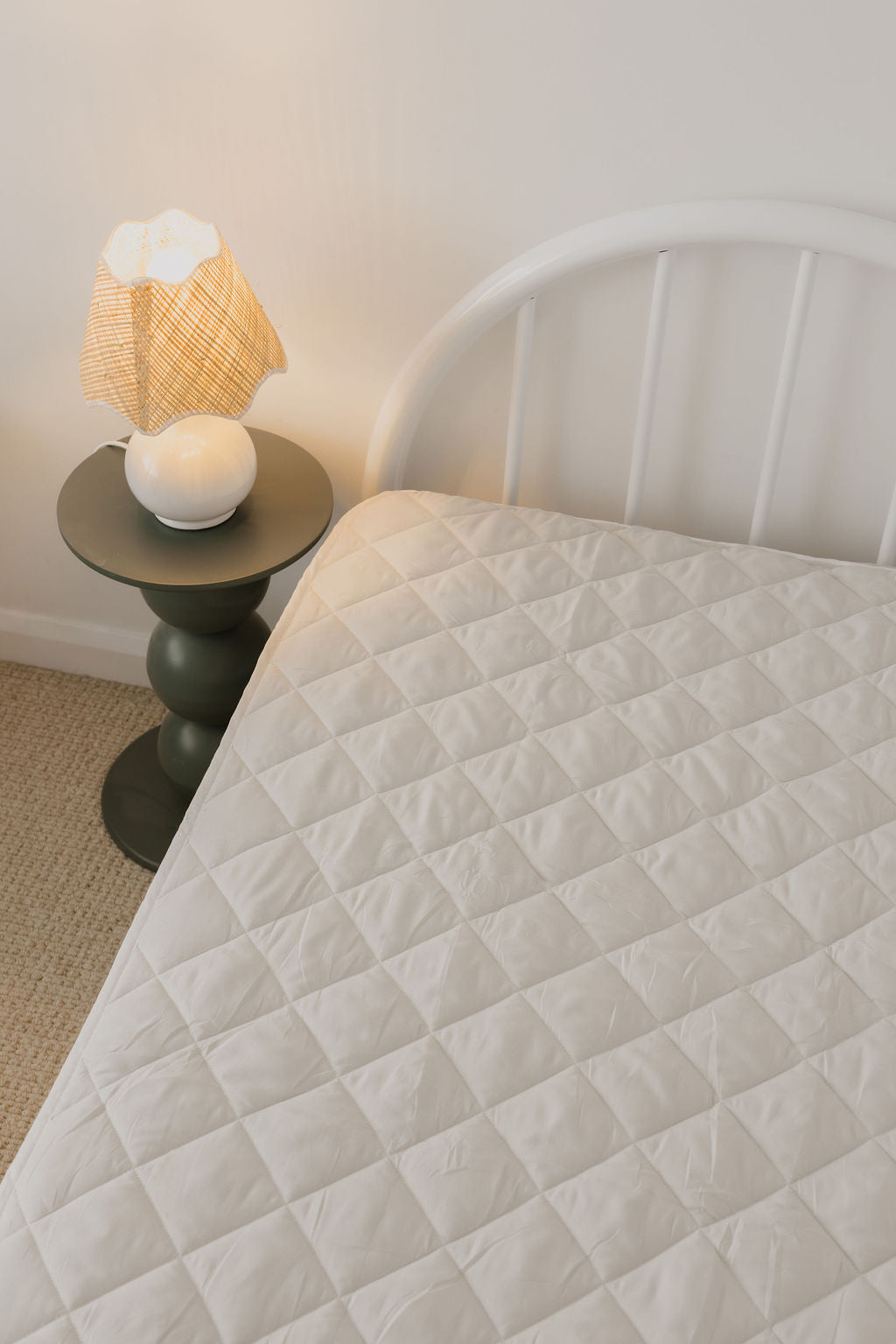 Rudie Baby waterproof fitted sheet on bed - under-sheet protection for potty training