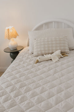 Rudie Baby leakproof fitted sheet on bed - nighttime toilet training protection Australia