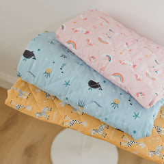 Rudie Baby leakproof bed guard on cot, lifestyle photo